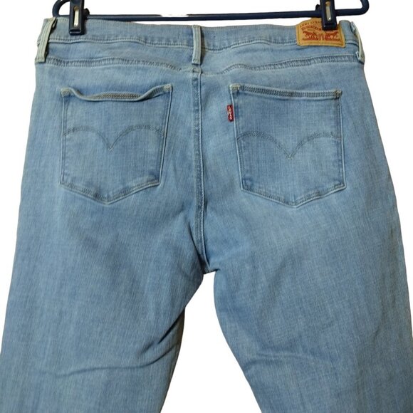 Levi’s Women's Size 33 Slimming Skinny Distressed Light Blue Mid-Rise Jeans - Picture 5 of 6